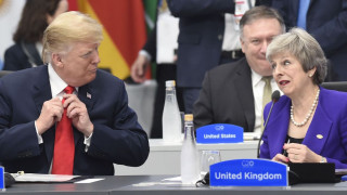 Trump retrouve May après avoir taclé sa gestion du Brexit